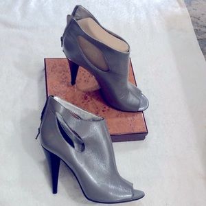 Peekaboo stiletto heel ankle boots , light gray Patton leather,,  black Heel .